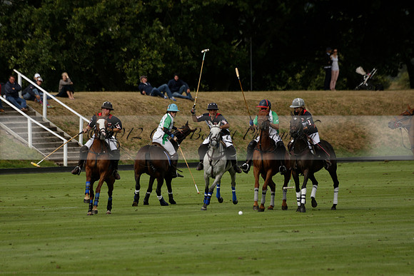 Jaeger Le Coultre (black)  v Wairakei Pastoral (white) in a Jaeger Le Coultre Holden White Cup polo match played on 29 July 2013 at Cowdray Park Polo Club on Brooksfieldwww.polopictures.co.uk