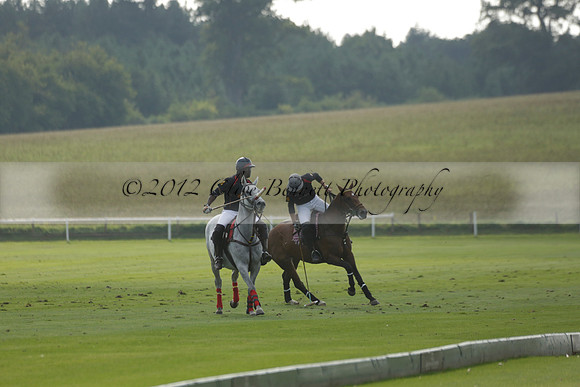 Pluma Negra (white) v Shoreline (black) in the Brecknock Cup Subsidiary final polo match played on Sunday 25 August 2013 at Cowdray Park Polo Club on Ambersham 1. 2013.10.12 www.polopictures.co.uk