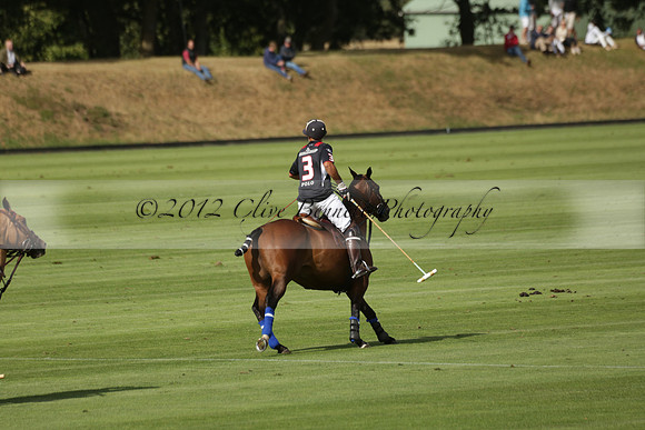 Jaeger Le Coultre (black)  v Wairakei Pastoral (white) in a Jaeger Le Coultre Holden White Cup polo match played on 29 July 2013 at Cowdray Park Polo Club on Brooksfieldwww.polopictures.co.uk