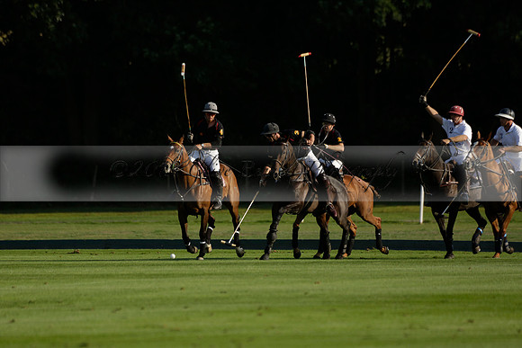 Pluma Negra (white) v Shoreline (black) in the Brecknock Cup Subsidiary final polo match played on Sunday 25 August 2013 at Cowdray Park Polo Club on Ambersham 1. 2013.10.12 www.polopictures.co.uk