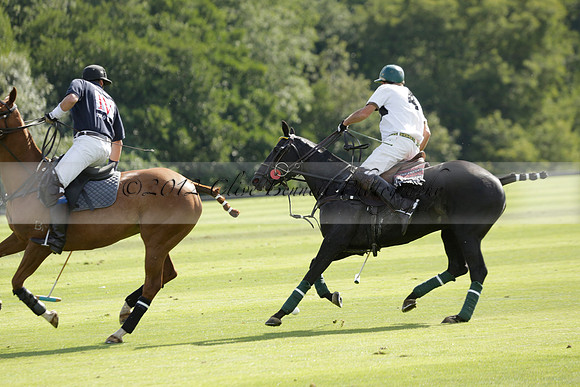 Pandas (white) v Home Farm (navy) in a Park House West Sussex Cup Polo match on Brooksfield at Cowdray Park Polo Club on Friday 30 August 2013. 2013.08.30 www.polopictures.co.uk