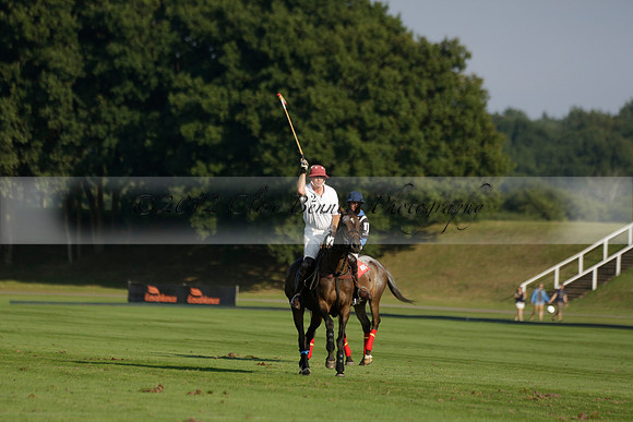 Pluma Negra (white) v Shoreline (black) in the Brecknock Cup Subsidiary final polo match played on Sunday 25 August 2013 at Cowdray Park Polo Club on Ambersham 1. 2013.10.12 www.polopictures.co.uk