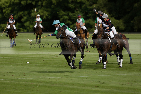 Jaeger Le Coultre (black)  v Wairakei Pastoral (white) in a Jaeger Le Coultre Holden White Cup polo match played on 29 July 2013 at Cowdray Park Polo Club on Brooksfieldwww.polopictures.co.uk