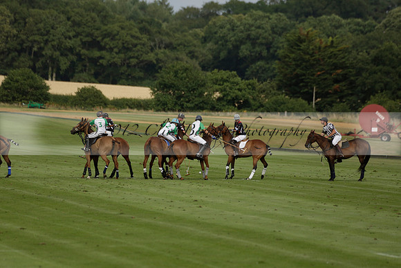 Jaeger Le Coultre (black)  v Wairakei Pastoral (white) in a Jaeger Le Coultre Holden White Cup polo match played on 29 July 2013 at Cowdray Park Polo Club on Brooksfieldwww.polopictures.co.uk