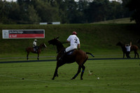 Pluma Negra (white) v Shoreline (black) in the Brecknock Cup Subsidiary final polo match played on Sunday 25 August 2013 at Cowdray Park Polo Club on Ambersham 1. 2013.10.12 www.polopictures.co.uk