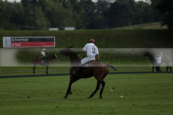 Pluma Negra (white) v Shoreline (black) in the Brecknock Cup Subsidiary final polo match played on Sunday 25 August 2013 at Cowdray Park Polo Club on Ambersham 1. 2013.10.12 www.polopictures.co.uk
