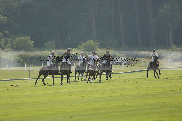 Pluma Negra (white) v Shoreline (black) in the Brecknock Cup Subsidiary final polo match played on Sunday 25 August 2013 at Cowdray Park Polo Club on Ambersham 1. 2013.10.12 www.polopictures.co.uk