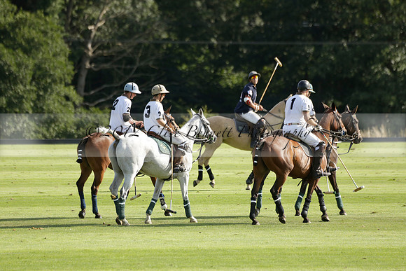 Pandas (white) v Home Farm (navy) in a Park House West Sussex Cup Polo match on Brooksfield at Cowdray Park Polo Club on Friday 30 August 2013. 2013.08.30 www.polopictures.co.uk