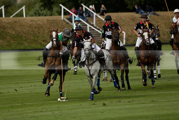 Jaeger Le Coultre (black)  v Wairakei Pastoral (white) in a Jaeger Le Coultre Holden White Cup polo match played on 29 July 2013 at Cowdray Park Polo Club on Brooksfieldwww.polopictures.co.uk