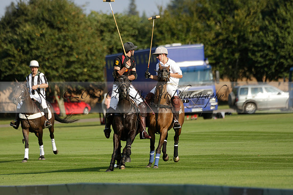 Pluma Negra (white) v Shoreline (black) in the Brecknock Cup Subsidiary final polo match played on Sunday 25 August 2013 at Cowdray Park Polo Club on Ambersham 1. 2013.10.12 www.polopictures.co.uk