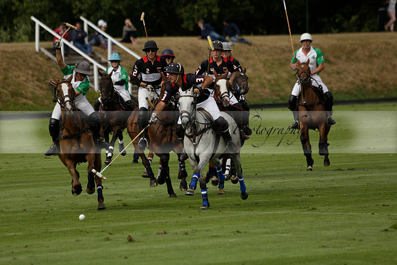 Jaeger Le Coultre (black)  v Wairakei Pastoral (white) in a Jaeger Le Coultre Holden White Cup polo match played on 29 July 2013 at Cowdray Park Polo Club on Brooksfieldwww.polopictures.co.uk