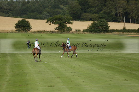 Jaeger Le Coultre (black)  v Wairakei Pastoral (white) in a Jaeger Le Coultre Holden White Cup polo match played on 29 July 2013 at Cowdray Park Polo Club on Brooksfieldwww.polopictures.co.uk