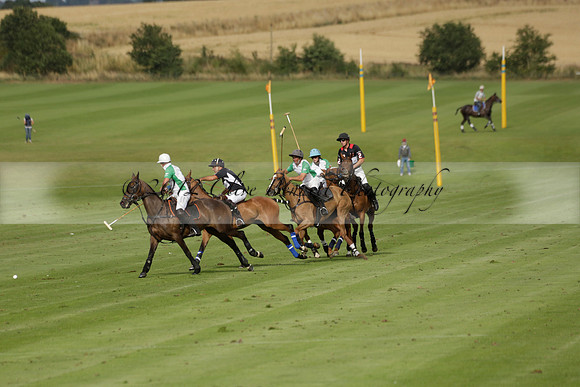 Jaeger Le Coultre (black)  v Wairakei Pastoral (white) in a Jaeger Le Coultre Holden White Cup polo match played on 29 July 2013 at Cowdray Park Polo Club on Brooksfieldwww.polopictures.co.uk
