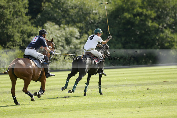 Pandas (white) v Home Farm (navy) in a Park House West Sussex Cup Polo match on Brooksfield at Cowdray Park Polo Club on Friday 30 August 2013. 2013.08.30 www.polopictures.co.uk