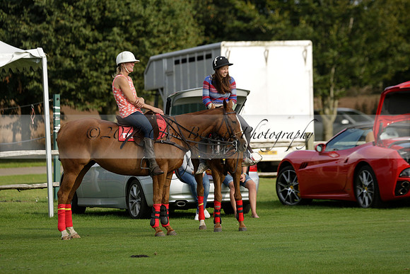 Pluma Negra (white) v Shoreline (black) in the Brecknock Cup Subsidiary final polo match played on Sunday 25 August 2013 at Cowdray Park Polo Club on Ambersham 1. 2013.10.12 www.polopictures.co.uk