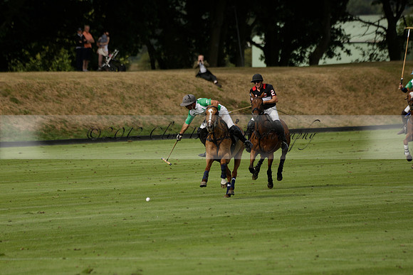 Jaeger Le Coultre (black)  v Wairakei Pastoral (white) in a Jaeger Le Coultre Holden White Cup polo match played on 29 July 2013 at Cowdray Park Polo Club on Brooksfieldwww.polopictures.co.uk