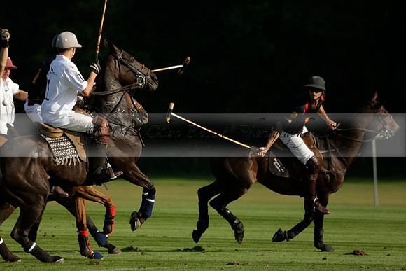 Pluma Negra (white) v Shoreline (black) in the Brecknock Cup Subsidiary final polo match played on Sunday 25 August 2013 at Cowdray Park Polo Club on Ambersham 1. 2013.10.12 www.polopictures.co.uk