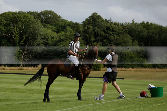 Jaeger Le Coultre (black)  v Wairakei Pastoral (white) in a Jaeger Le Coultre Holden White Cup polo match played on 29 July 2013 at Cowdray Park Polo Club on Brooksfieldwww.polopictures.co.uk