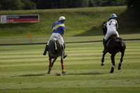 Combe Place (blue) v Silver Fox (white) in a Park House West Sussex Cup Polo match on Ambersham 1 at Cowdray Park Polo Club on Friday 30 August 2013. 2013.08.30 www.polopictures.co.uk