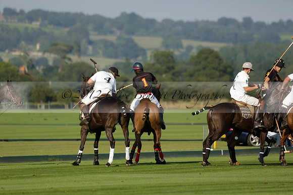 Pluma Negra (white) v Shoreline (black) in the Brecknock Cup Subsidiary final polo match played on Sunday 25 August 2013 at Cowdray Park Polo Club on Ambersham 1. 2013.10.12 www.polopictures.co.uk