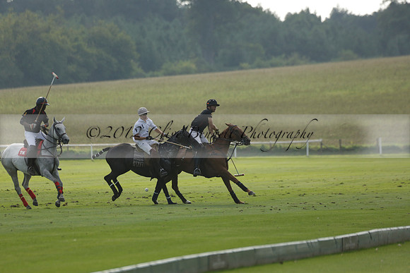 Pluma Negra (white) v Shoreline (black) in the Brecknock Cup Subsidiary final polo match played on Sunday 25 August 2013 at Cowdray Park Polo Club on Ambersham 1. 2013.10.12 www.polopictures.co.uk