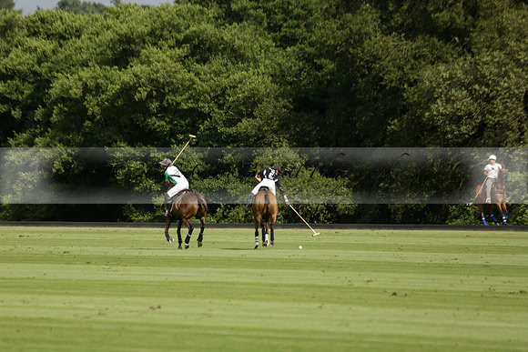 Jaeger Le Coultre (black)  v Wairakei Pastoral (white) in a Jaeger Le Coultre Holden White Cup polo match played on 29 July 2013 at Cowdray Park Polo Club on Brooksfieldwww.polopictures.co.uk