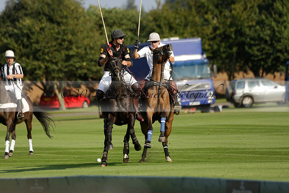 Pluma Negra (white) v Shoreline (black) in the Brecknock Cup Subsidiary final polo match played on Sunday 25 August 2013 at Cowdray Park Polo Club on Ambersham 1. 2013.10.12 www.polopictures.co.uk
