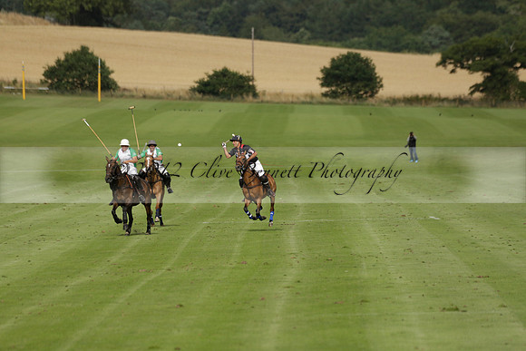 Jaeger Le Coultre (black)  v Wairakei Pastoral (white) in a Jaeger Le Coultre Holden White Cup polo match played on 29 July 2013 at Cowdray Park Polo Club on Brooksfieldwww.polopictures.co.uk
