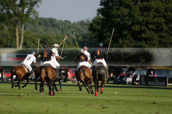 Pluma Negra (white) v Shoreline (black) in the Brecknock Cup Subsidiary final polo match played on Sunday 25 August 2013 at Cowdray Park Polo Club on Ambersham 1. 2013.10.12 www.polopictures.co.uk