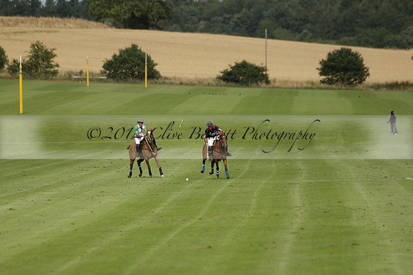 Jaeger Le Coultre (black)  v Wairakei Pastoral (white) in a Jaeger Le Coultre Holden White Cup polo match played on 29 July 2013 at Cowdray Park Polo Club on Brooksfieldwww.polopictures.co.uk