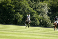 Pandas (white) v Home Farm (navy) in a Park House West Sussex Cup Polo match on Brooksfield at Cowdray Park Polo Club on Friday 30 August 2013. 2013.08.30 www.polopictures.co.uk
