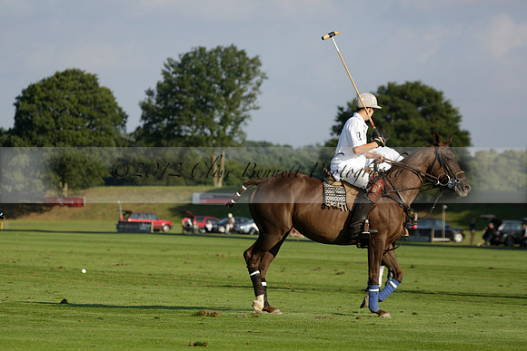 Pluma Negra (white) v Shoreline (black) in the Brecknock Cup Subsidiary final polo match played on Sunday 25 August 2013 at Cowdray Park Polo Club on Ambersham 1. 2013.10.12 www.polopictures.co.uk