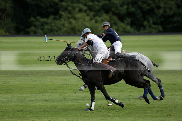 Pandas (white) v Home Farm (navy) in a Park House West Sussex Cup Polo match on Brooksfield at Cowdray Park Polo Club on Friday 30 August 2013. 2013.08.30 www.polopictures.co.uk