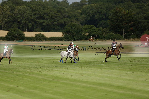 Jaeger Le Coultre (black)  v Wairakei Pastoral (white) in a Jaeger Le Coultre Holden White Cup polo match played on 29 July 2013 at Cowdray Park Polo Club on Brooksfieldwww.polopictures.co.uk