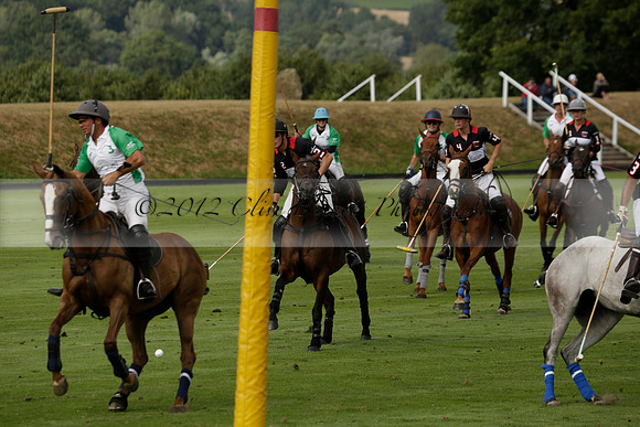 Jaeger Le Coultre (black)  v Wairakei Pastoral (white) in a Jaeger Le Coultre Holden White Cup polo match played on 29 July 2013 at Cowdray Park Polo Club on Brooksfieldwww.polopictures.co.uk