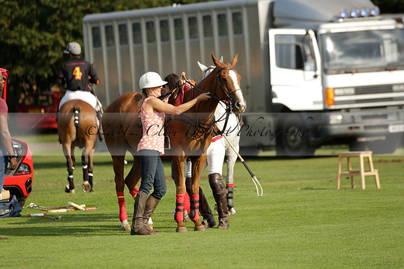 Pluma Negra (white) v Shoreline (black) in the Brecknock Cup Subsidiary final polo match played on Sunday 25 August 2013 at Cowdray Park Polo Club on Ambersham 1. 2013.10.12 www.polopictures.co.uk