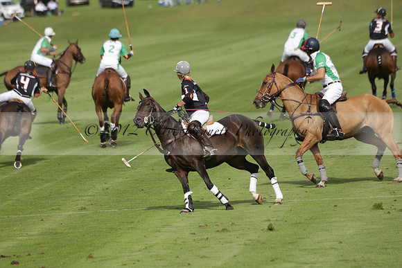 Jaeger Le Coultre (black)  v Wairakei Pastoral (white) in a Jaeger Le Coultre Holden White Cup polo match played on 29 July 2013 at Cowdray Park Polo Club on Brooksfieldwww.polopictures.co.uk