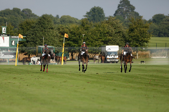 Pluma Negra (white) v Shoreline (black) in the Brecknock Cup Subsidiary final polo match played on Sunday 25 August 2013 at Cowdray Park Polo Club on Ambersham 1. 2013.10.12 www.polopictures.co.uk