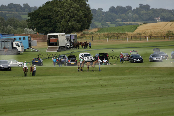 Jaeger Le Coultre (black)  v Wairakei Pastoral (white) in a Jaeger Le Coultre Holden White Cup polo match played on 29 July 2013 at Cowdray Park Polo Club on Brooksfieldwww.polopictures.co.uk