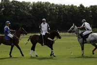 Combe Place (blue) v Silver Fox (white) in a Park House West Sussex Cup Polo match on Ambersham 1 at Cowdray Park Polo Club on Friday 30 August 2013. 2013.08.30 www.polopictures.co.uk