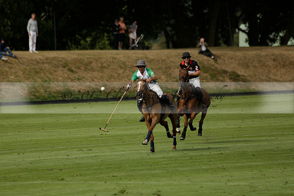 Jaeger Le Coultre (black)  v Wairakei Pastoral (white) in a Jaeger Le Coultre Holden White Cup polo match played on 29 July 2013 at Cowdray Park Polo Club on Brooksfieldwww.polopictures.co.uk