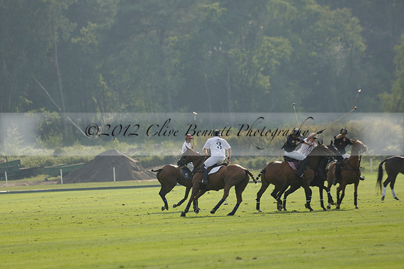 Pluma Negra (white) v Shoreline (black) in the Brecknock Cup Subsidiary final polo match played on Sunday 25 August 2013 at Cowdray Park Polo Club on Ambersham 1. 2013.10.12 www.polopictures.co.uk