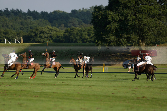 Pluma Negra (white) v Shoreline (black) in the Brecknock Cup Subsidiary final polo match played on Sunday 25 August 2013 at Cowdray Park Polo Club on Ambersham 1. 2013.10.12 www.polopictures.co.uk
