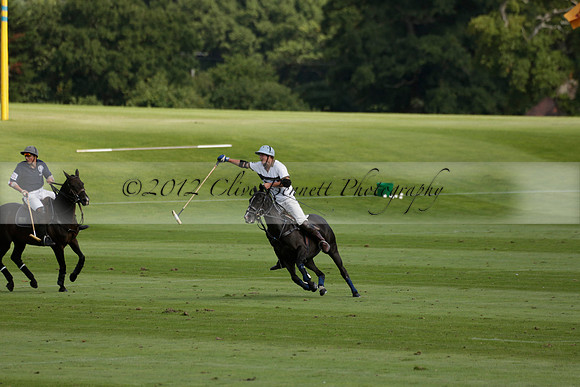 Pandas (white) v Home Farm (navy) in a Park House West Sussex Cup Polo match on Brooksfield at Cowdray Park Polo Club on Friday 30 August 2013. 2013.08.30 www.polopictures.co.uk