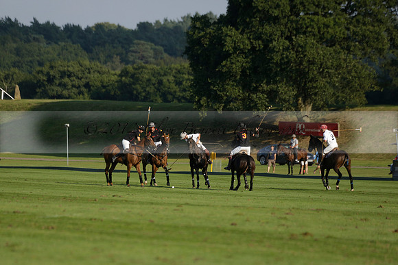 Pluma Negra (white) v Shoreline (black) in the Brecknock Cup Subsidiary final polo match played on Sunday 25 August 2013 at Cowdray Park Polo Club on Ambersham 1. 2013.10.12 www.polopictures.co.uk