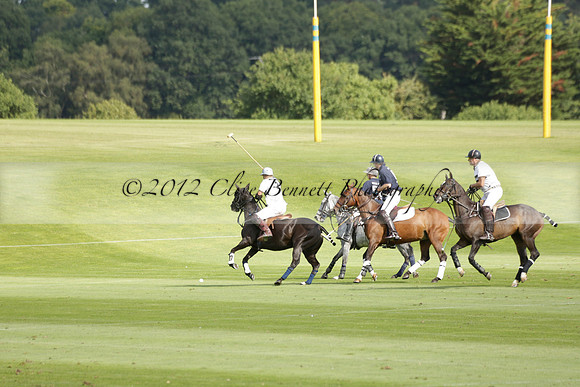 Pandas (white) v Home Farm (navy) in a Park House West Sussex Cup Polo match on Brooksfield at Cowdray Park Polo Club on Friday 30 August 2013. 2013.08.30 www.polopictures.co.uk