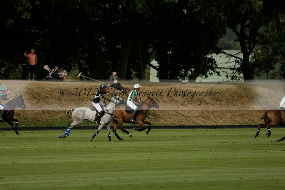 Jaeger Le Coultre (black)  v Wairakei Pastoral (white) in a Jaeger Le Coultre Holden White Cup polo match played on 29 July 2013 at Cowdray Park Polo Club on Brooksfieldwww.polopictures.co.uk