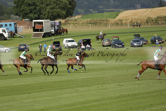 Jaeger Le Coultre (black)  v Wairakei Pastoral (white) in a Jaeger Le Coultre Holden White Cup polo match played on 29 July 2013 at Cowdray Park Polo Club on Brooksfieldwww.polopictures.co.uk