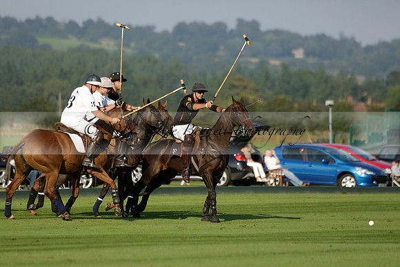 Pluma Negra (white) v Shoreline (black) in the Brecknock Cup Subsidiary final polo match played on Sunday 25 August 2013 at Cowdray Park Polo Club on Ambersham 1. 2013.10.12 www.polopictures.co.uk