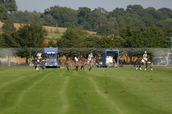 Pluma Negra (white) v Shoreline (black) in the Brecknock Cup Subsidiary final polo match played on Sunday 25 August 2013 at Cowdray Park Polo Club on Ambersham 1. 2013.10.12 www.polopictures.co.uk